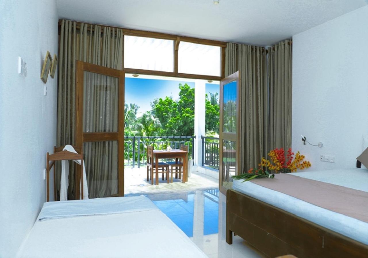 High Park Hotel นิลาเวลี ภายนอก รูปภาพ